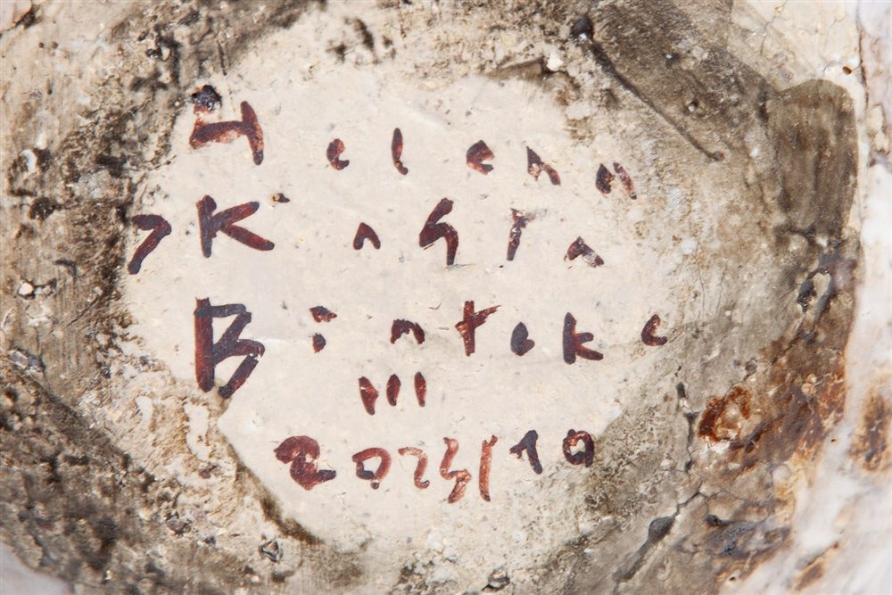 Signature on the base of a vessel by Kasia Białek: month, year and number of the work